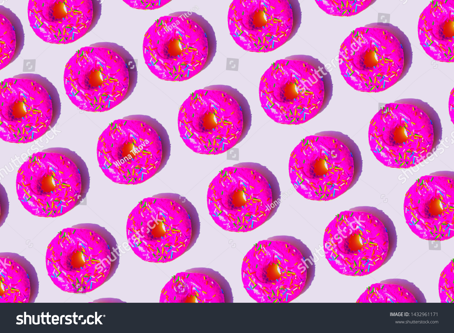 Repeating seamless pattern of pink cream donuts in neon light.