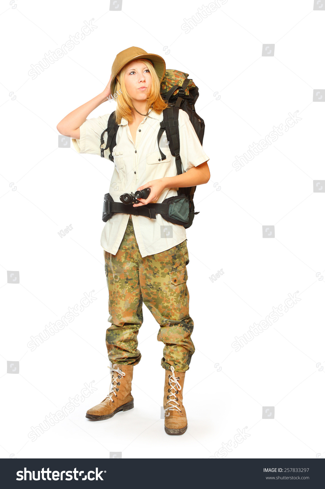 Young explorer with backpack going to holidays.