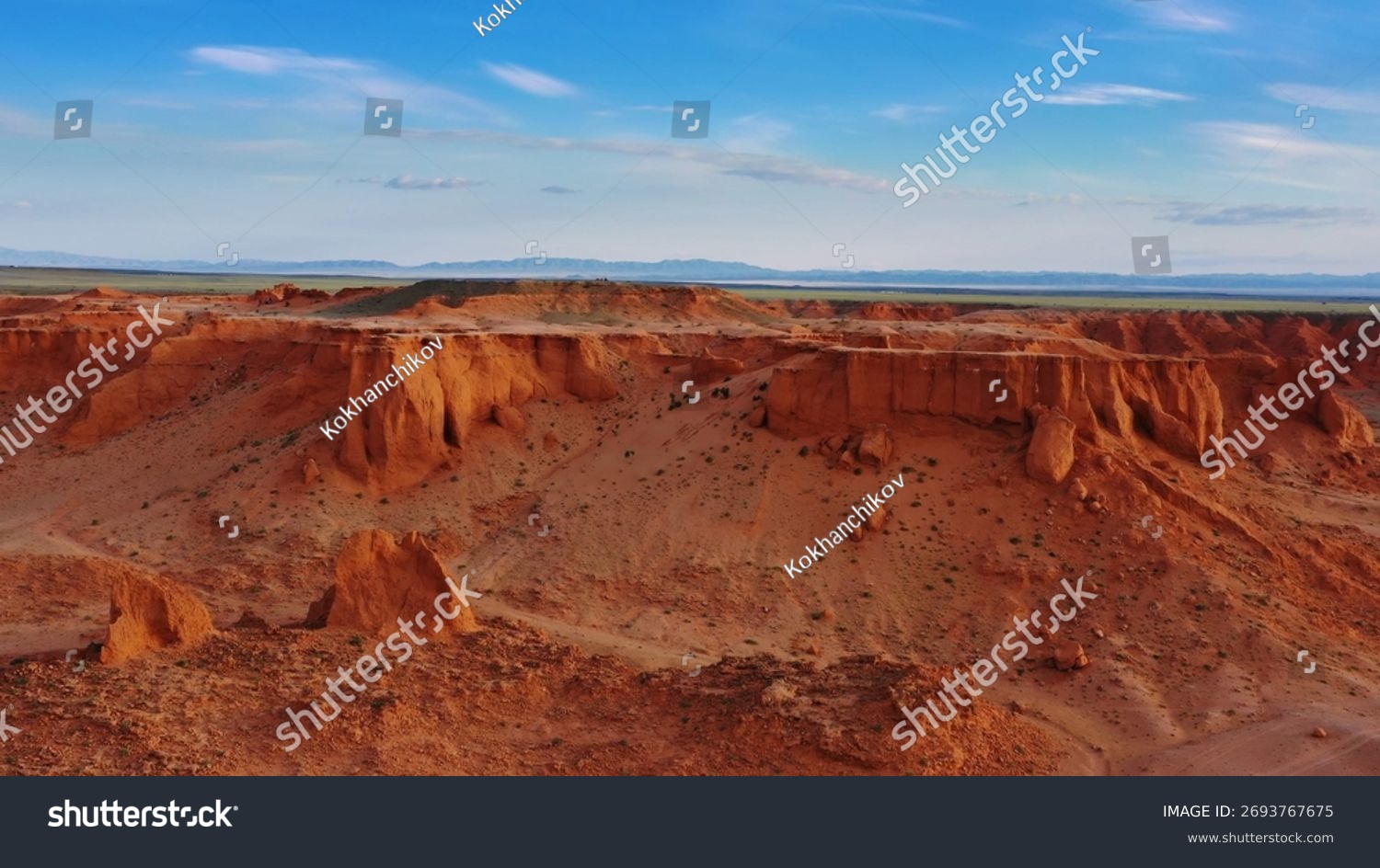 Aerial view of the Bayanzag flaming cliffs at sunset in Mongolia  found in the Gobi Desert