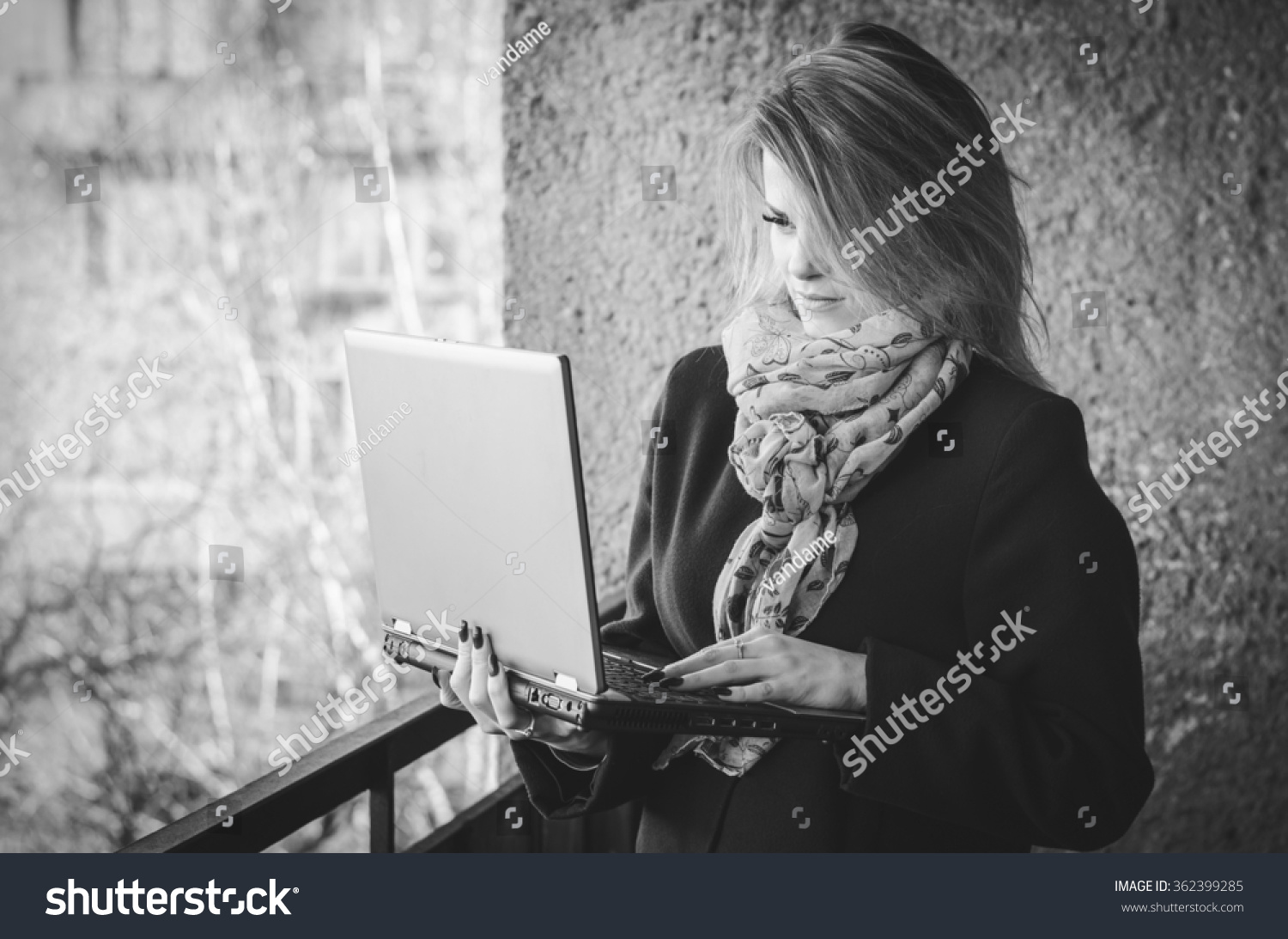 Young girl with a laptop horizontal photo
