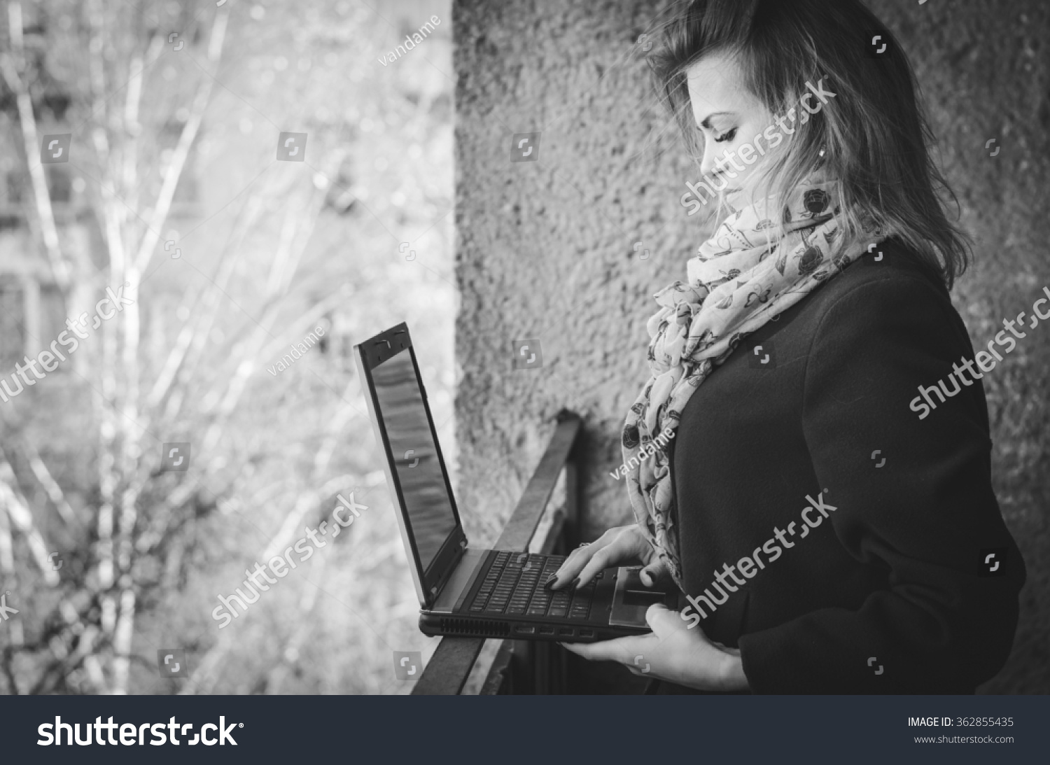 Young girl with a laptop horizontal photo