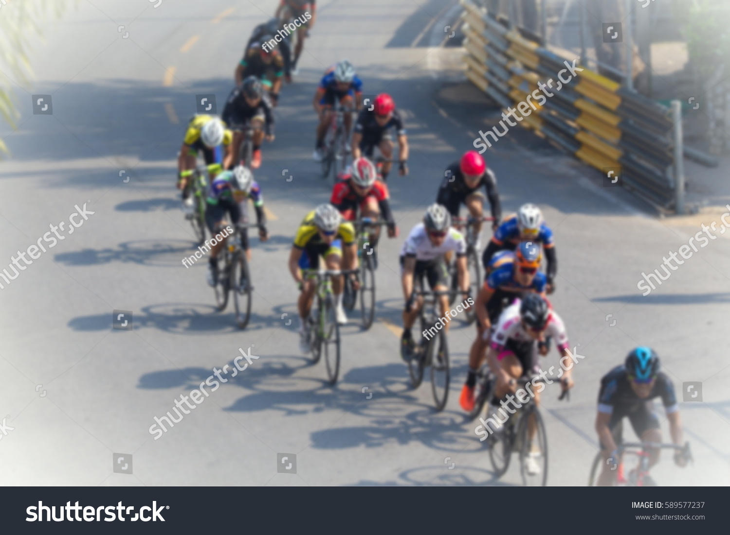 Cyclist cycling on the road for good healthy. Blurred for background and free space for text.