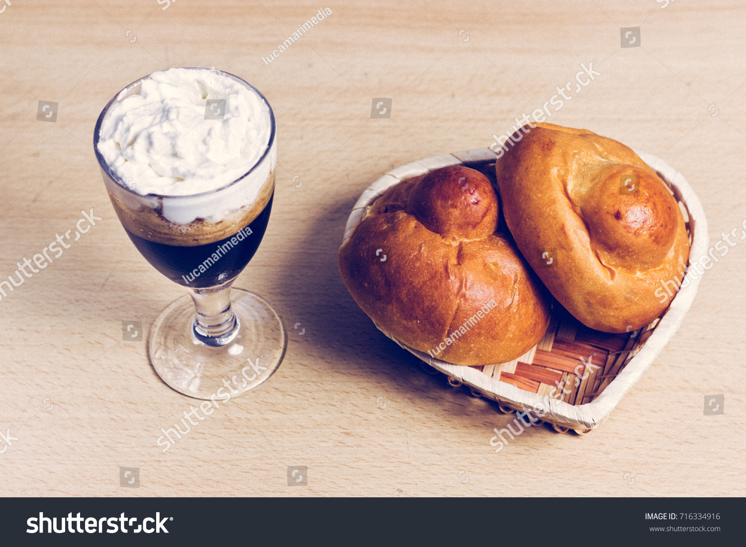 Traditional Sicilian Granita with Coffee and Cream and Two Brioches.